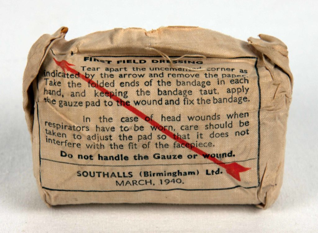 Gauze field dressing made by Southalls (Birmingham) Ltd, 1940. Southalls were using this highly absorbent material to produce sanitary pads in 1880.