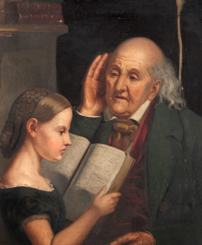 Reading Aloud by John Levack (1828-1874), 1861 depicts a young girl reading a book to an elderly man who is cupping his ear.