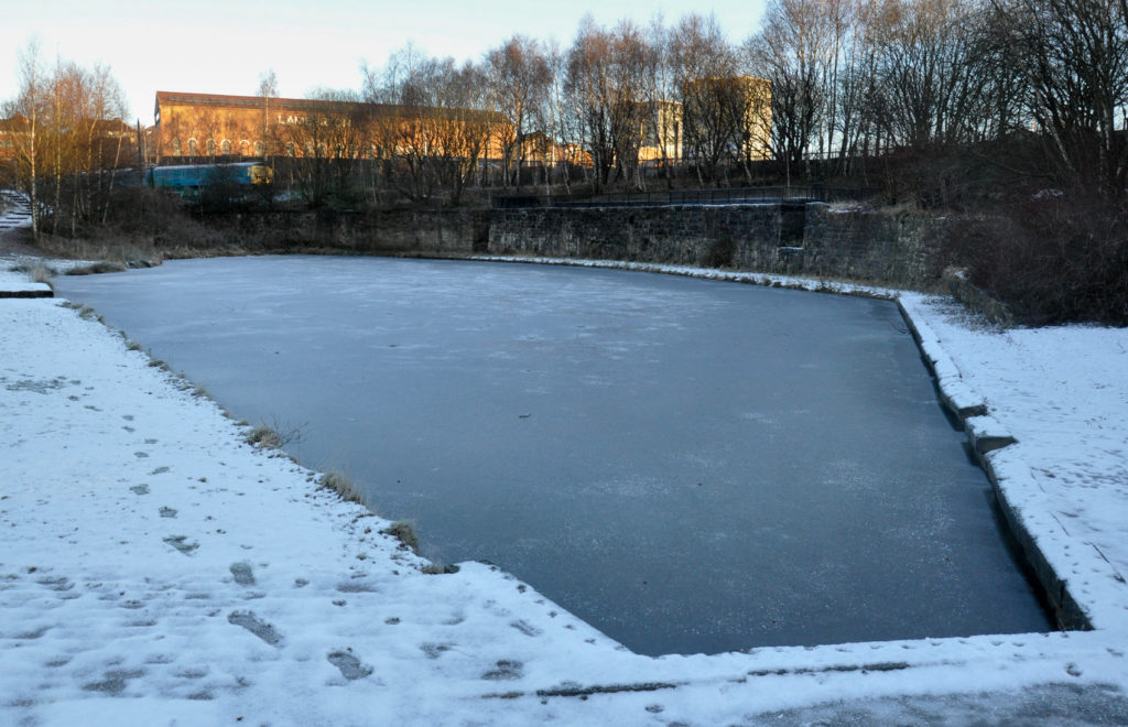 Howes Basin frozen over in December 2012. The coal drops are visible on the other side.