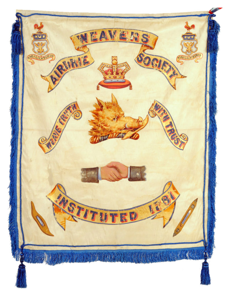White silk banner with blue silk thread fringing, cords and tassles, handpainted in gold, blue, red and grey depicting the Airdrie Weavers’ Society name, motto, symbols and Airdrie crests.