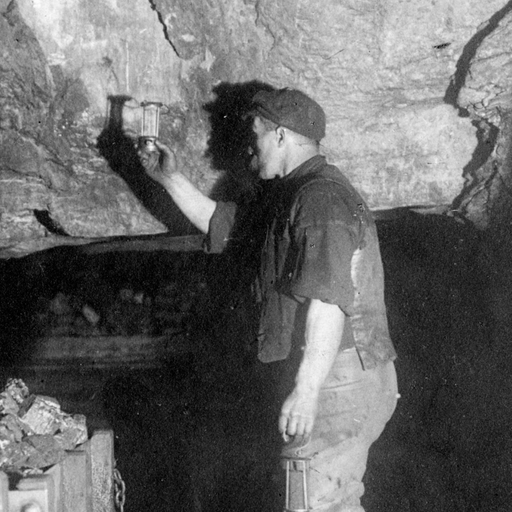 Testing for gas at Camp Colliery near Motherwell, around 1910.